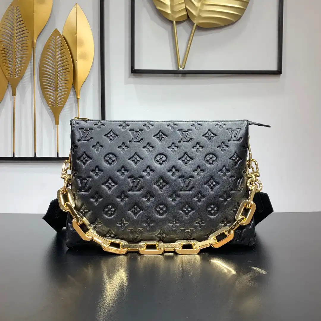 LOUIS VUITTON COUSSIN MM 0203